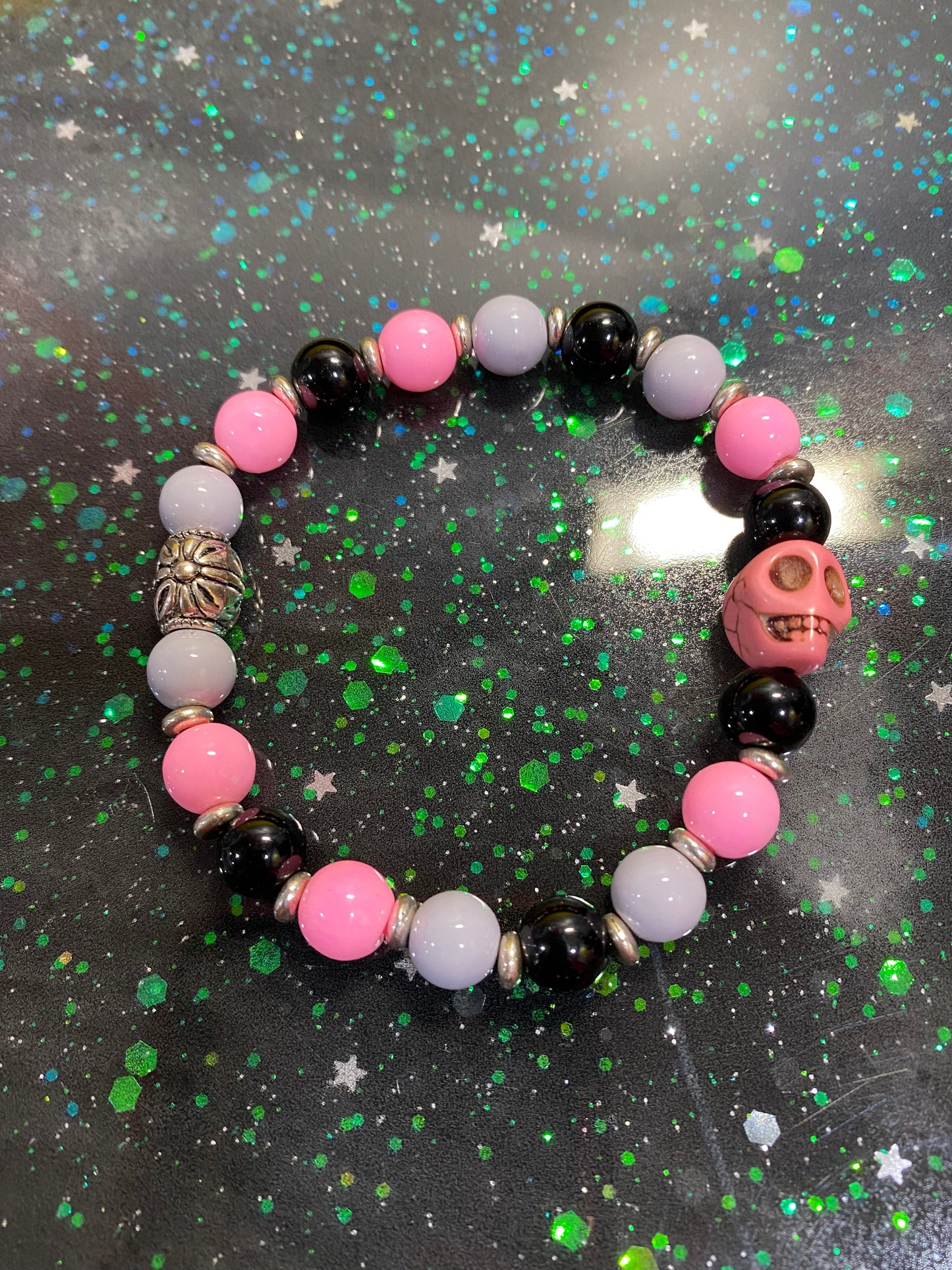 Pink and purple skull bracelet