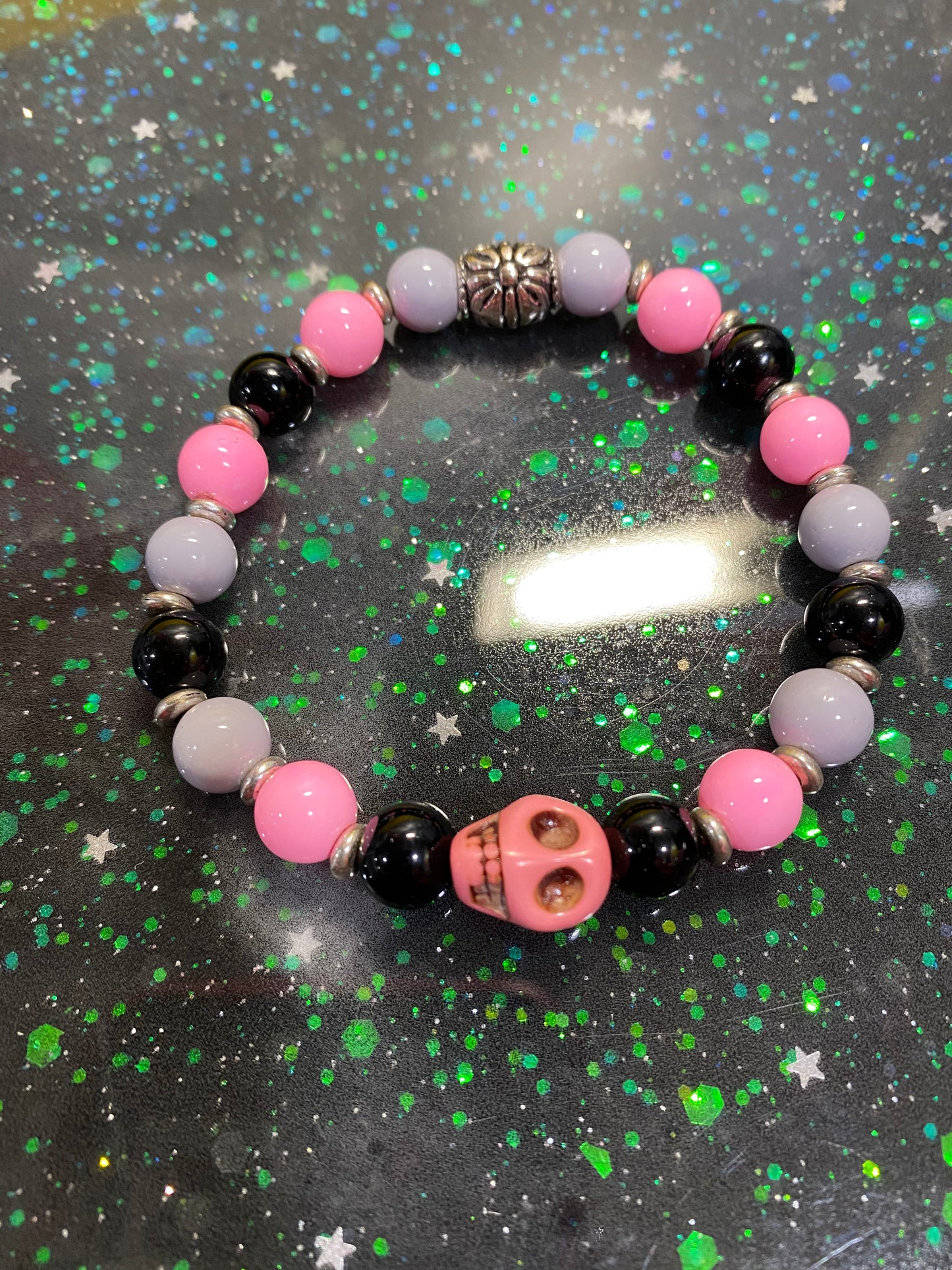 Pink and purple skull bracelet